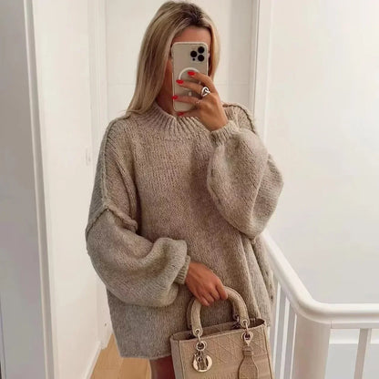Cozy knitted turtleneck sweater with voluminous statement sleeves 