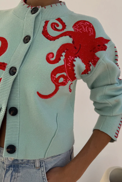 Cozy coastal cardigan with octopus motif and contrasting piping 