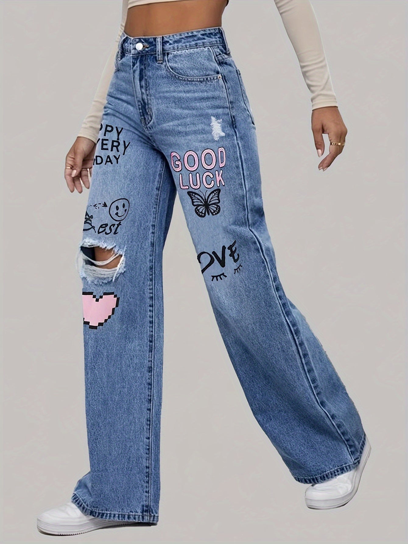 High-waisted jeans with wide leg and graphic design