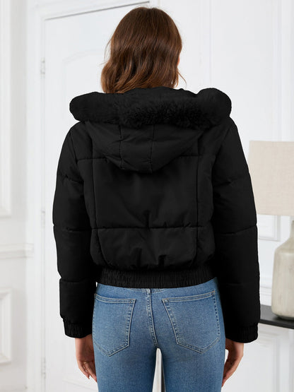 Cozy padded winter jacket with fur hood and pockets 