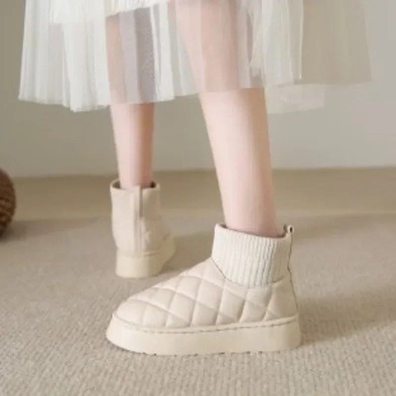 Cozy knitted sock booties with a thick sole and warm lining 