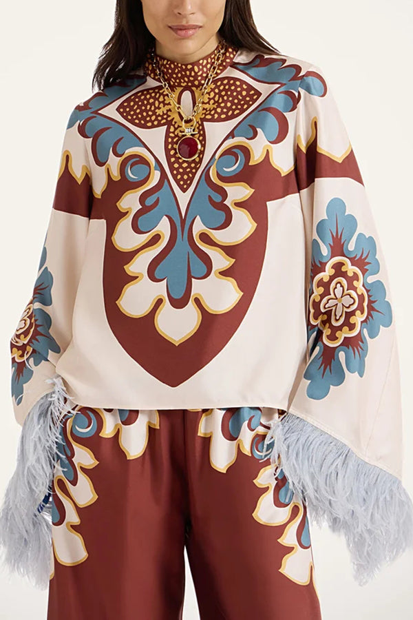 Boho top with bell sleeves, feather trim and high collar 