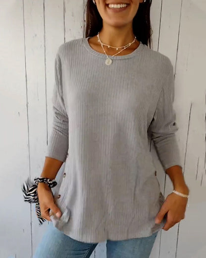 Cozy ribbed knit top with a round neckline and long sleeves 