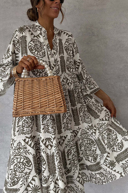 Printed mini dress with V-neck and bell sleeves 