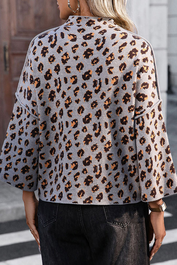 Cozy knit sweater with leopard print and loose roll neck