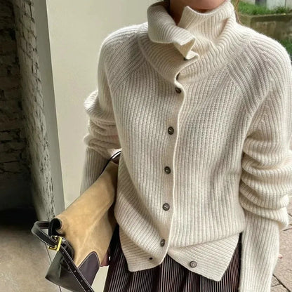 Cozy knitted sweater with roll neck and buttons 
