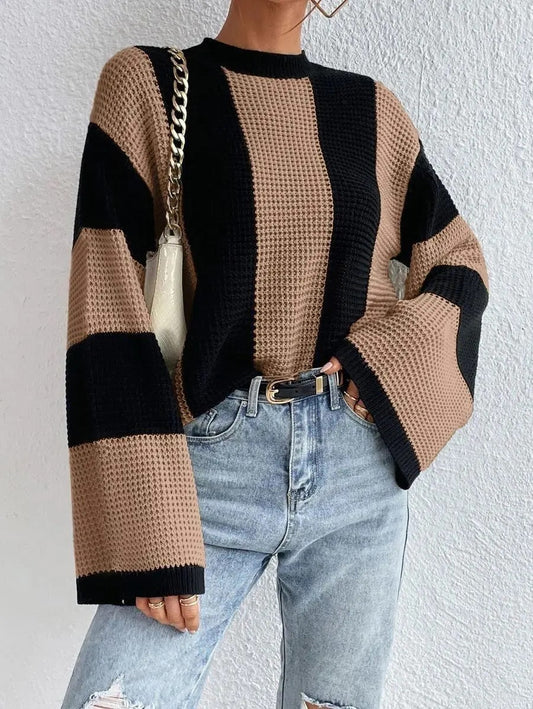 Cozy two-tone knit sweater with wide, casual sleeves