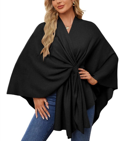 Soft, elegant shawl poncho for cozy-chic layering. 