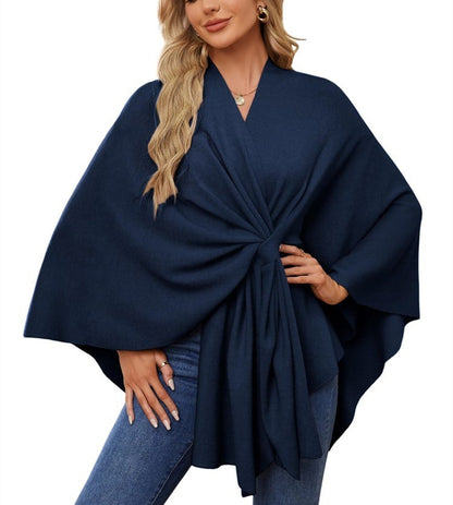 Soft, elegant shawl poncho for cozy-chic layering. 