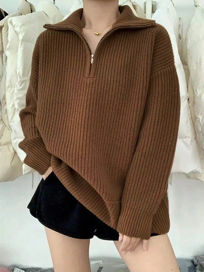 Cozy thick knit sweater with zip collar for autumn layering. 