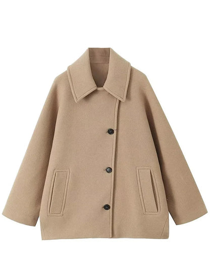 Oversized jacket with fold-down collar and side pockets 