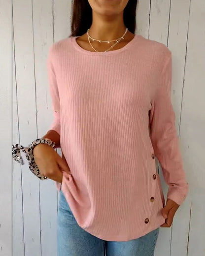 Cozy ribbed knit top with a round neckline and long sleeves 
