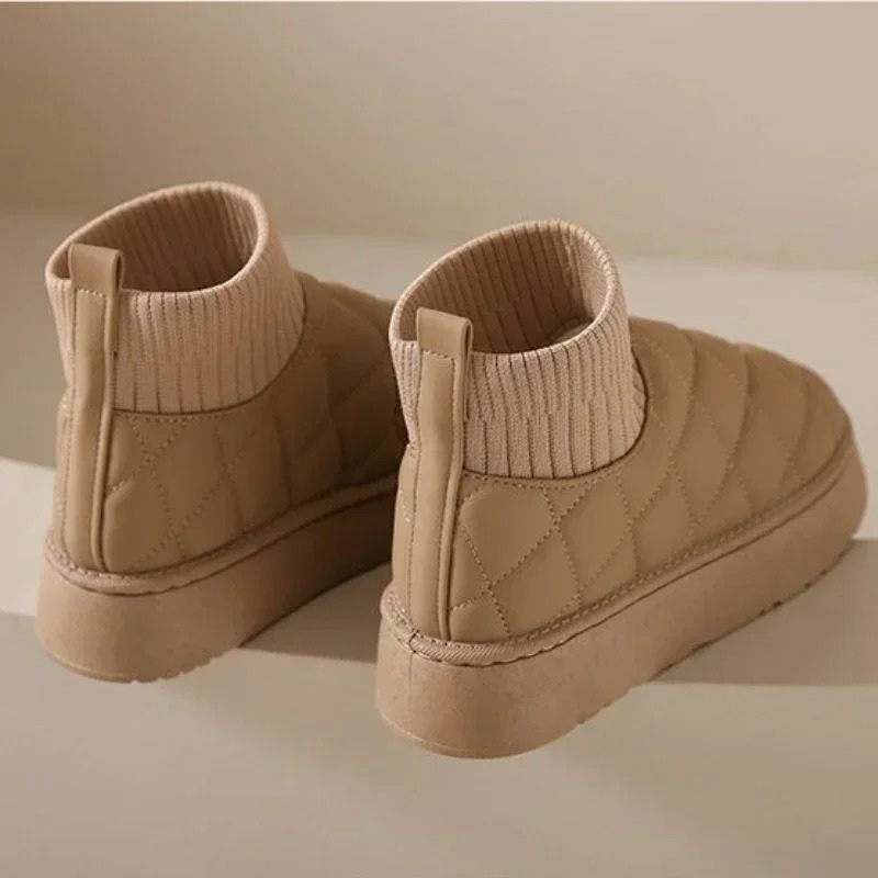 Cozy knitted sock booties with a thick sole and warm lining 