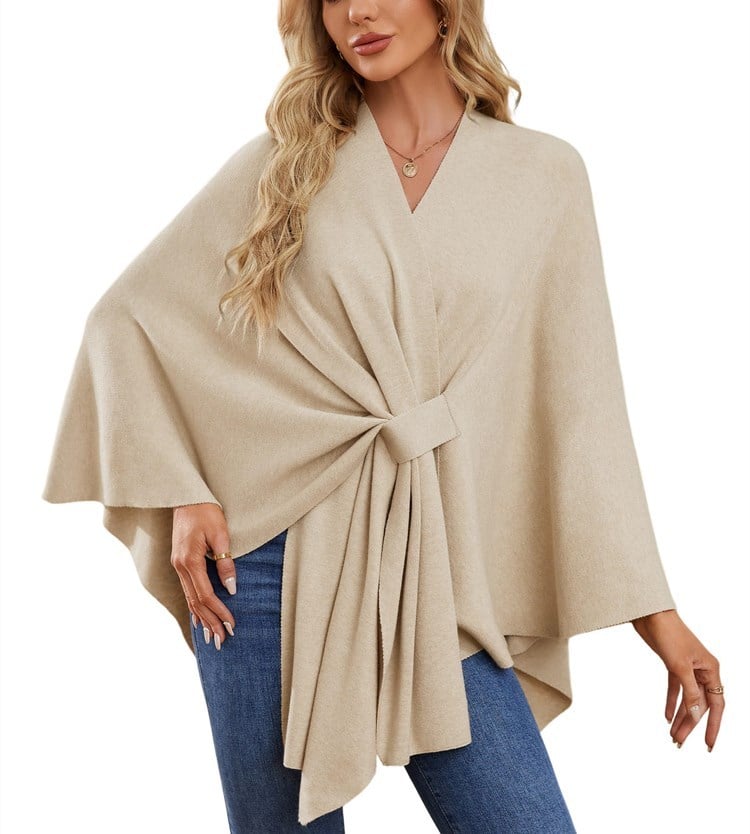 Soft, elegant shawl poncho for cozy-chic layering. 