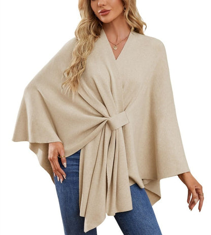 Soft, elegant shawl poncho for cozy-chic layering. 