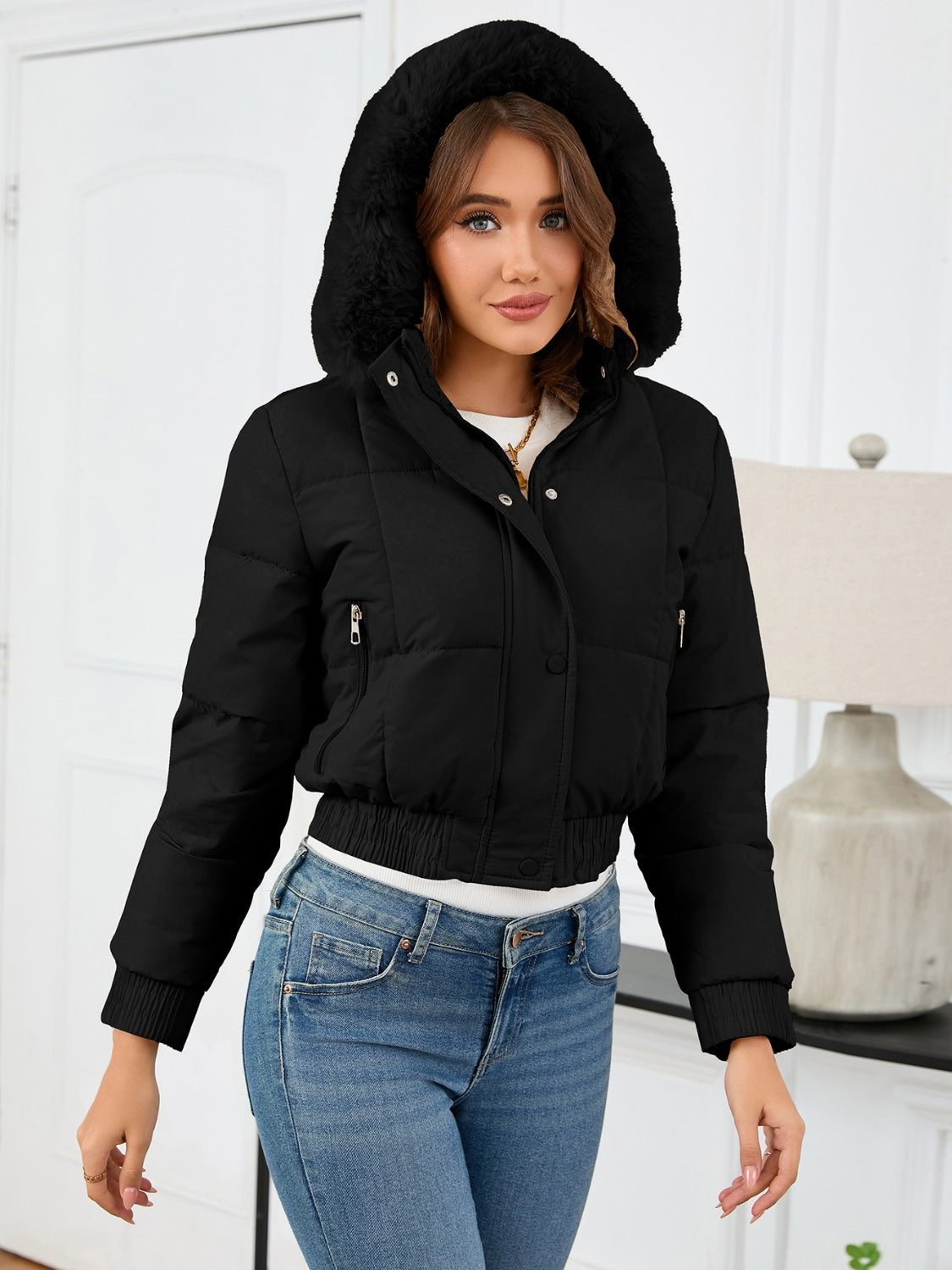 Cozy padded winter jacket with fur hood and pockets 
