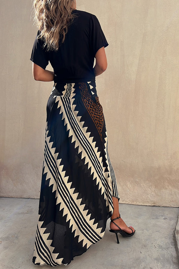 Maxi skirt with elastic waistband and geometric satin pattern 