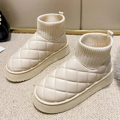 Cozy knitted sock booties with a thick sole and warm lining 