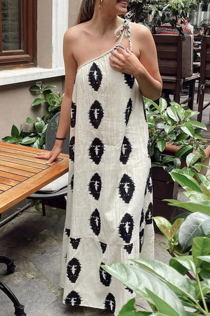 Karen | Printed white maxi dress with one-shoulder straps