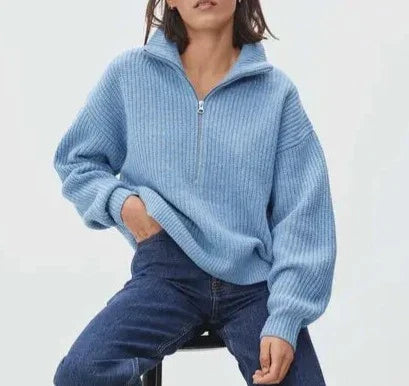 Cozy thick knit sweater with zip collar for autumn layering. 