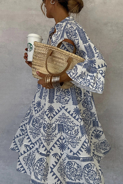 Printed mini dress with V-neck and bell sleeves 