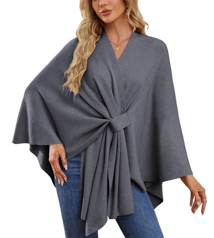 Soft, elegant shawl poncho for cozy-chic layering. 