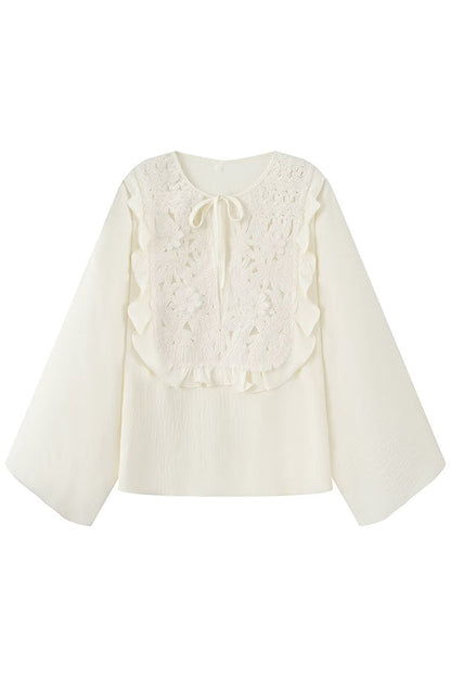 Casual top with a round neckline, waist lacing and open seams 