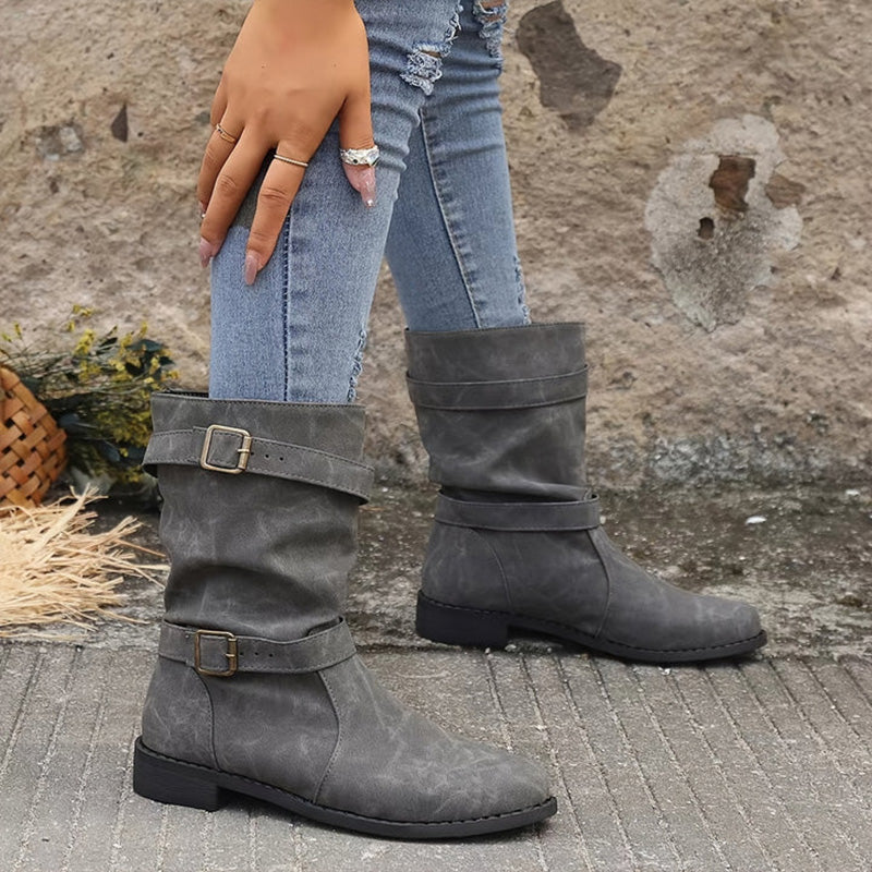 Stylish leather boots with buckle detail 