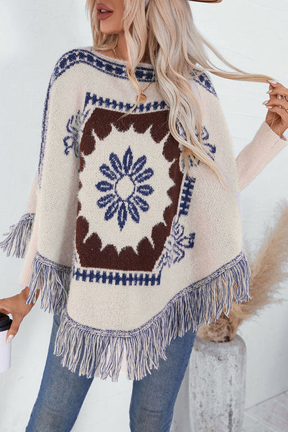 Boho knit sweater with tassel hem 