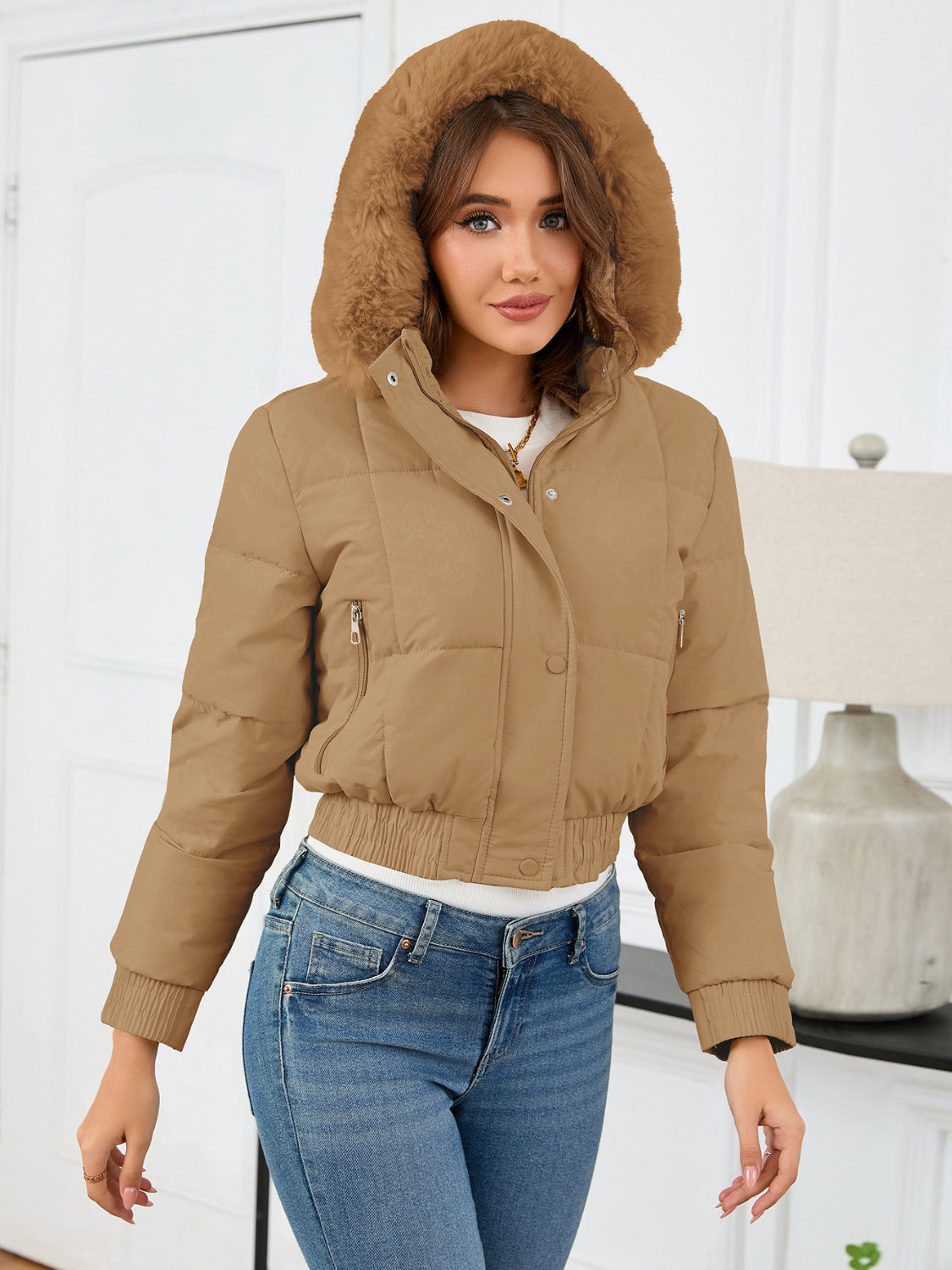 Cozy padded winter jacket with fur hood and pockets 