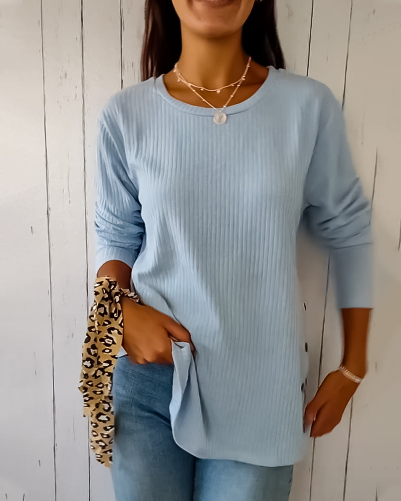 Cozy ribbed knit top with a round neckline and long sleeves 