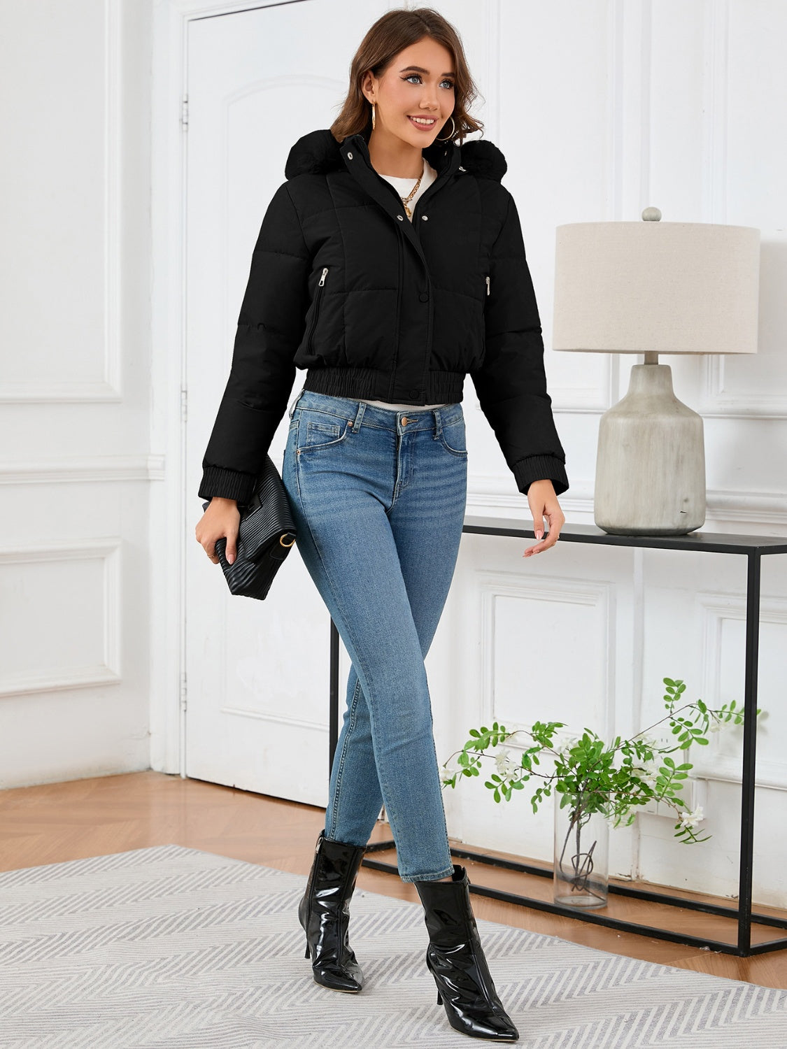 Cozy padded winter jacket with fur hood and pockets 