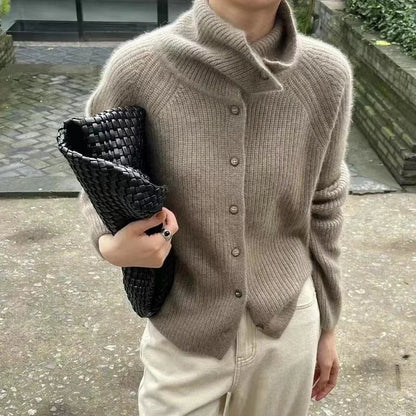 Cozy knitted sweater with roll neck and buttons 