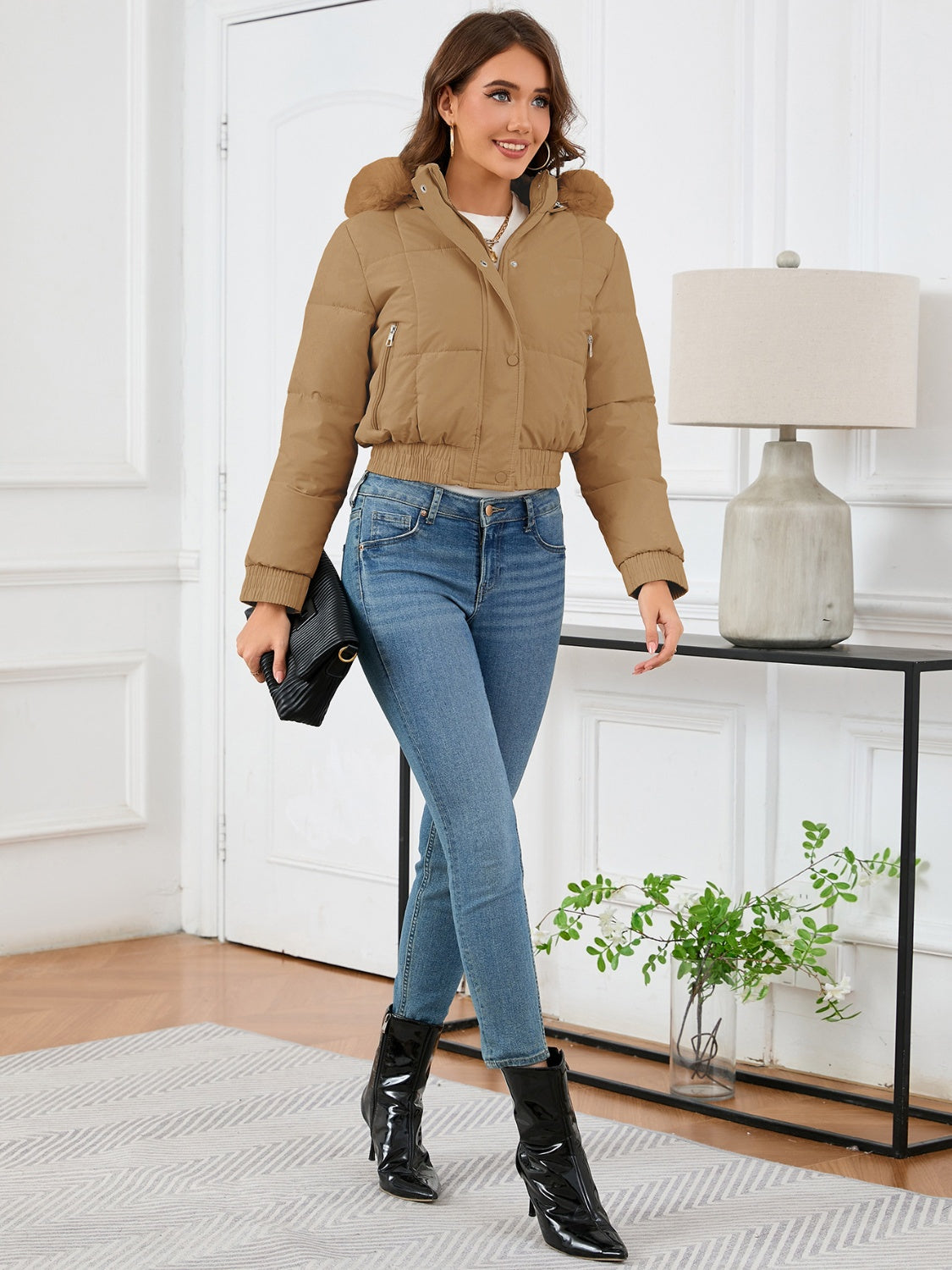 Cozy padded winter jacket with fur hood and pockets 