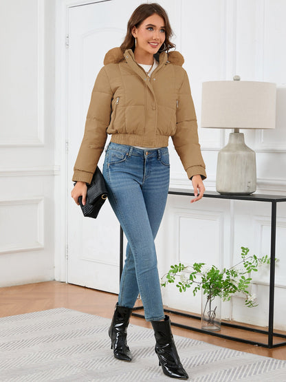 Cozy padded winter jacket with fur hood and pockets 