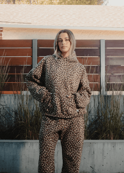 Cozy hoodie with cheetah print for casual everyday wear. 