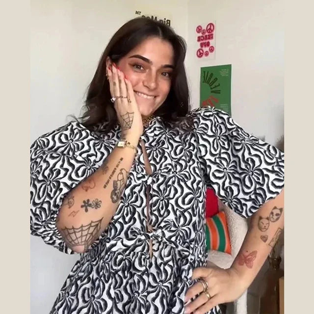 Blouse with leopard print, puff sleeves and bow detail 