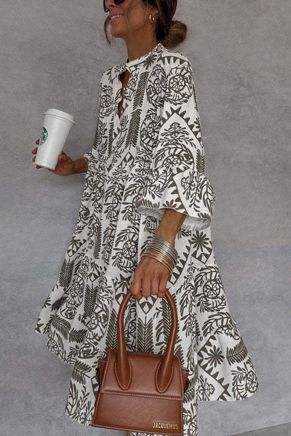 Printed mini dress with V-neck and bell sleeves 