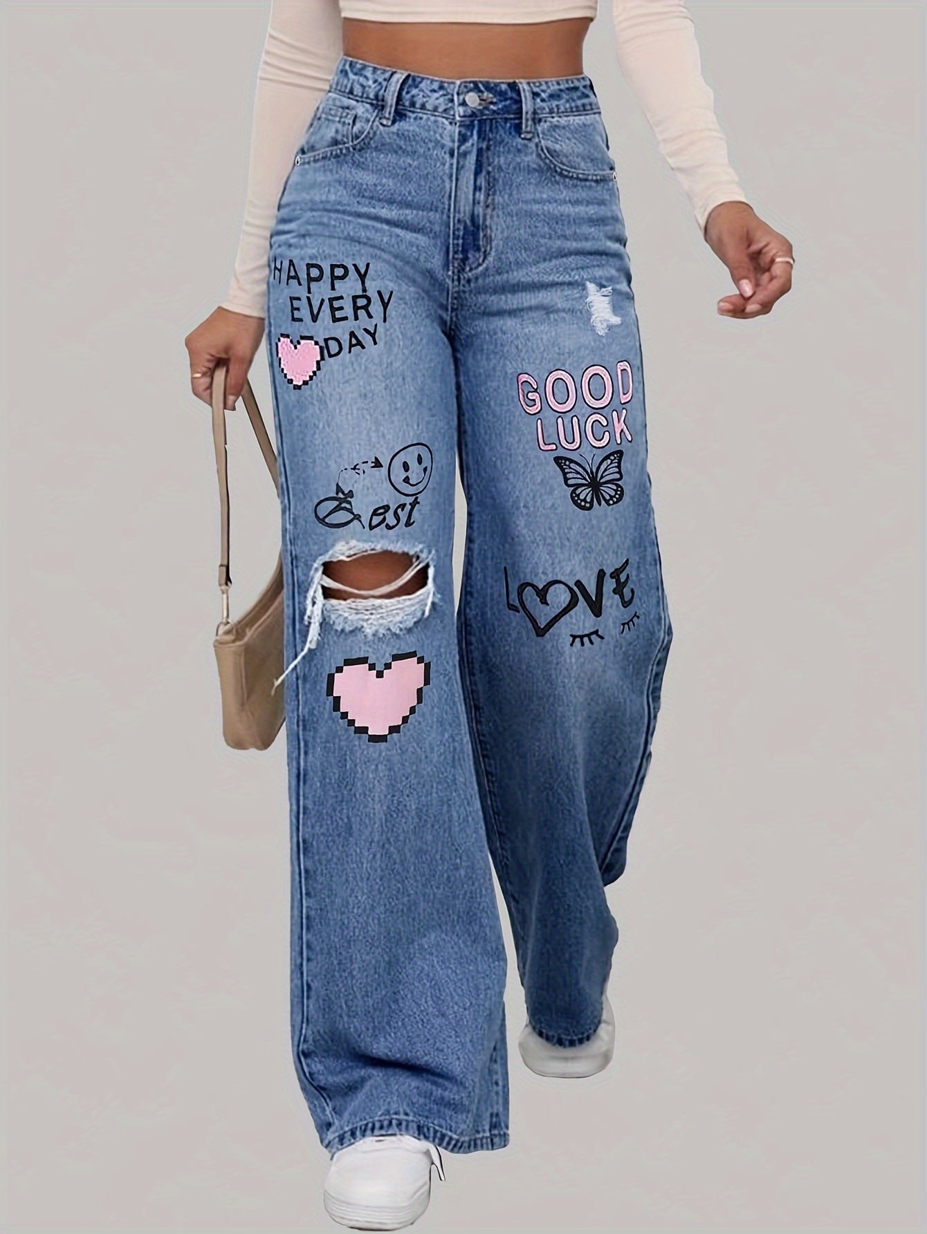 High-waisted jeans with wide leg and graphic design