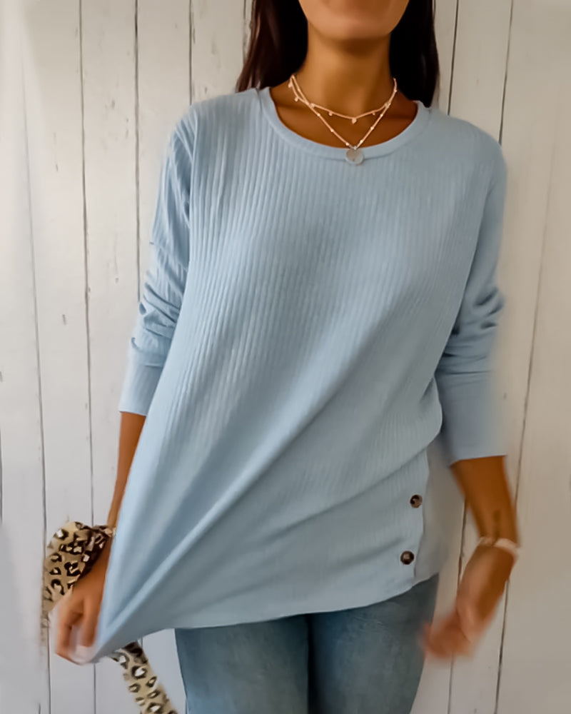Cozy ribbed knit top with a round neckline and long sleeves 