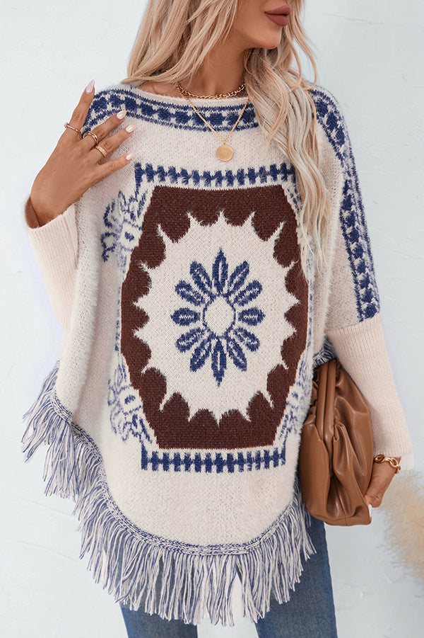 Boho knit sweater with tassel hem 