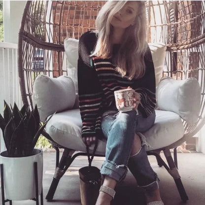 Cozy striped V-neck knit sweater for casual-chic looks. 