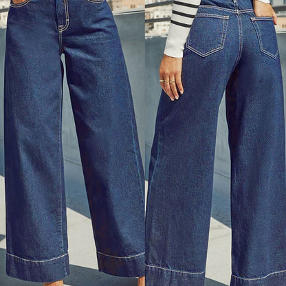 Jeans with a high waist, wide leg and stretchy denim fabric with a turn-up hem. 