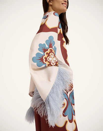 Boho top with bell sleeves, feather trim and high collar 