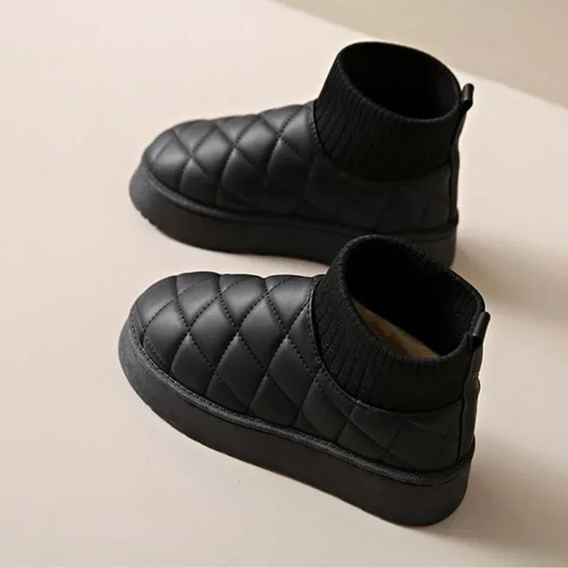 Cozy knitted sock booties with a thick sole and warm lining 