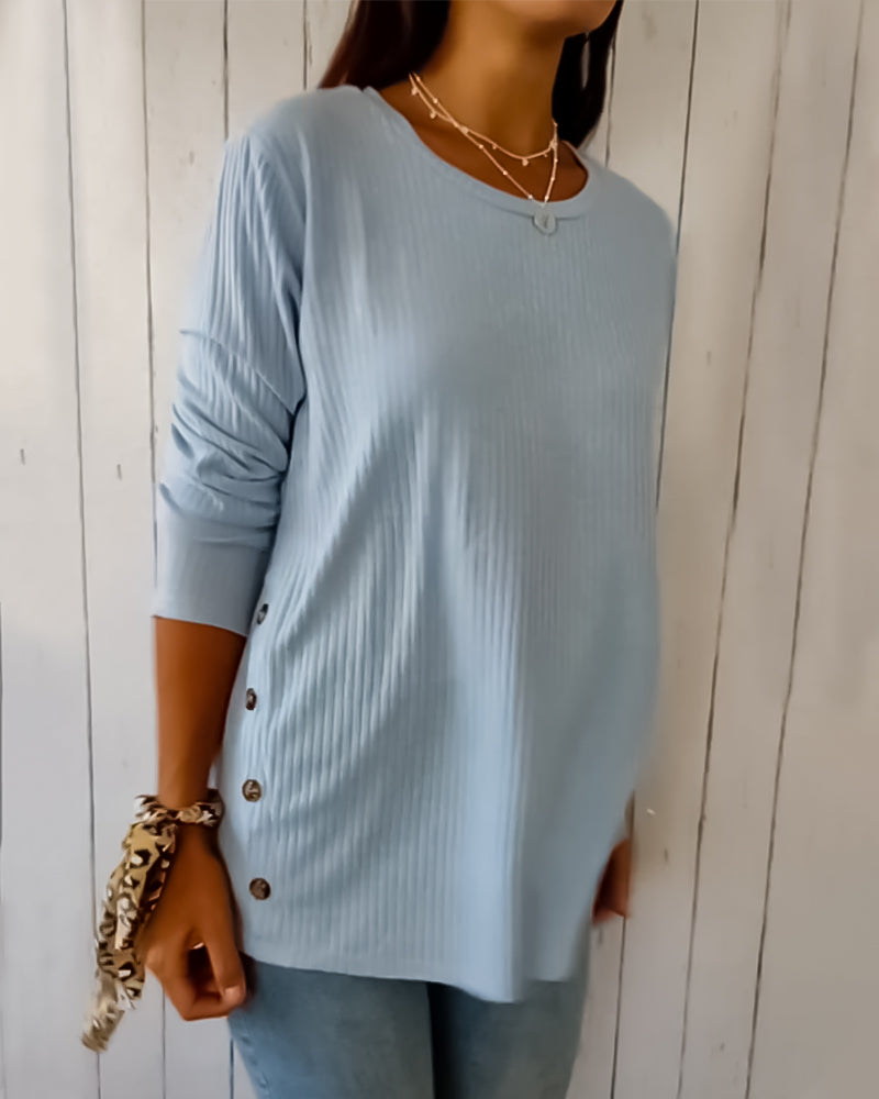 Cozy ribbed knit top with a round neckline and long sleeves 