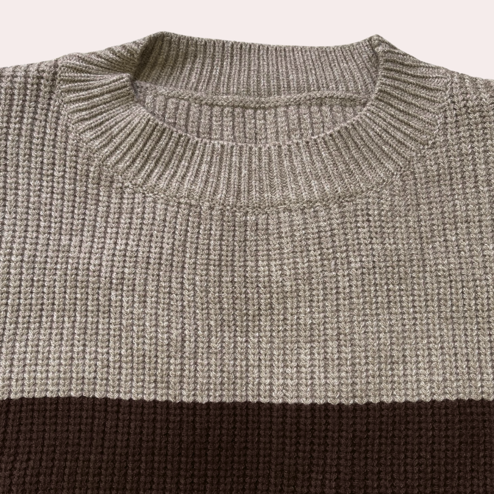 Two-tone knit sweater with cutouts on the sleeves 