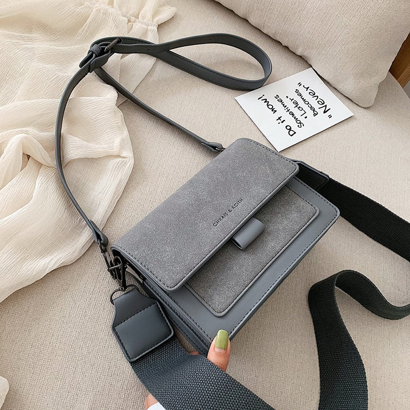Melisi™ - Wide-band shoulder bag