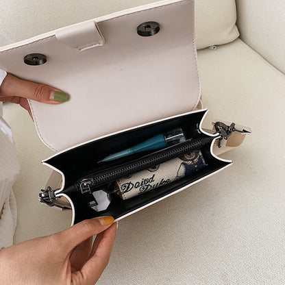 Melisi™ - Wide-band shoulder bag