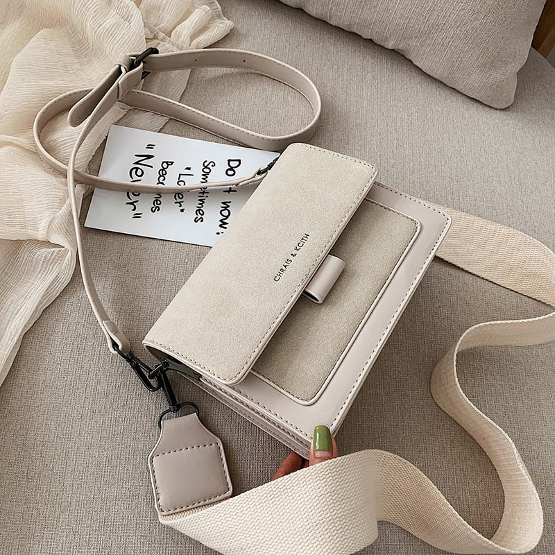 Melisi™ - Wide-band shoulder bag